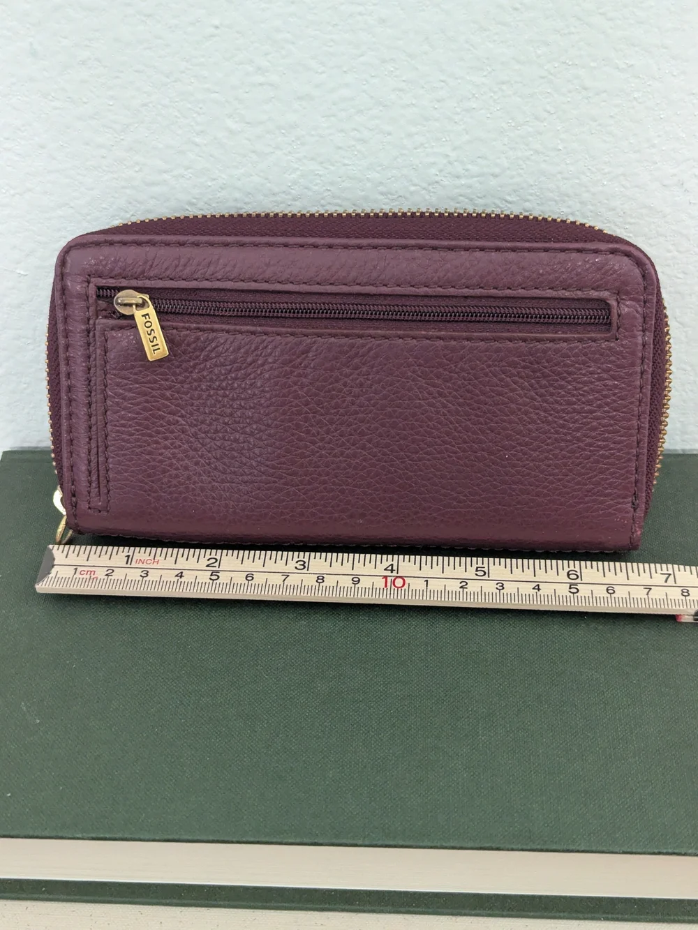 Fossil brass flap